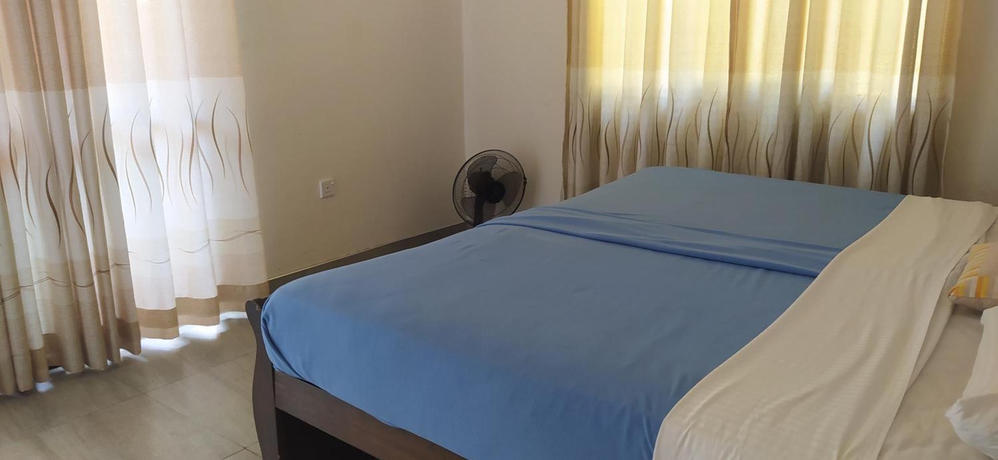 Ella Value Village Habitación foto